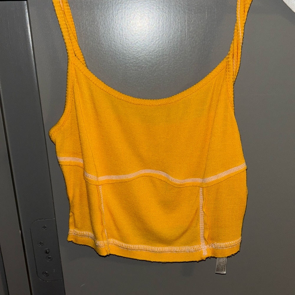 light orange tank. Urban Outfitters size small